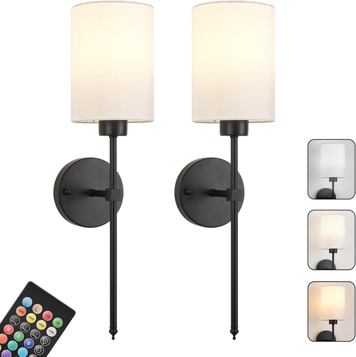 A set of two wireless wall sconces with black metal mounting and white fabric shades, displayed with a remote control.
