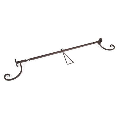 Decorative metal rod with hooks on a white background